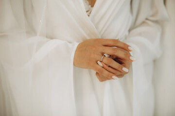 Wall Mural - Young bride wearing beautiful engagement ring, closeup