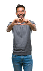 Sticker - Adult hispanic man over isolated background smiling in love showing heart symbol and shape with hands. Romantic concept.