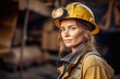 Woman professional miner in protective helmet works in mine. Female leader with dirty face takes man position doing heavy work underground