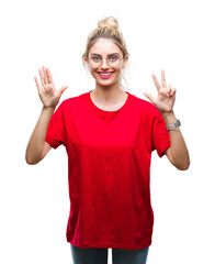 Sticker - Young beautiful blonde woman wearing red t-shirt and glasses over isolated background showing and pointing up with fingers number eight while smiling confident and happy.