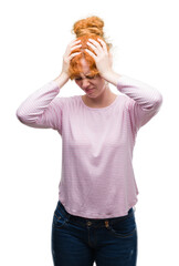 Sticker - Young redhead woman suffering from headache desperate and stressed because pain and migraine. Hands on head.