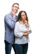 © Krakenimages.com - Middle age hispanic couple in love wearing glasses over isolated background with hand on chin thinking about question, pensive expression. Smiling with thoughtful face. Doubt concept.