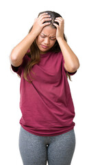 Sticker - Young beautiful brunette woman over isolated background suffering from headache desperate and stressed because pain and migraine. Hands on head.