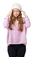 Sticker - Young beautiful brunette woman wearing sweater and winter hat over isolated background with hand on head for pain in head because stress. Suffering migraine.