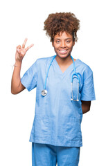 Young african american doctor woman over isolated background showing and pointing up with fingers number two while smiling confident and happy.