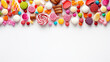 colorful background with composition with many different yummy candies on white background
