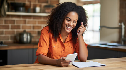 Canvas Print - Focused woman with curly hair, wearing a white shirt, reading a document in a bright, home office setting, with a laptop open in front of her.