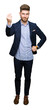 © Krakenimages.com - Young handsome bussines man Doing Italian gesture with hand and fingers confident expression