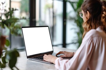 Business woman worker or student elearning looking at white mock up blank screen using laptop computer learning online, remote working, searching on web. Website mockup display template. Generative AI