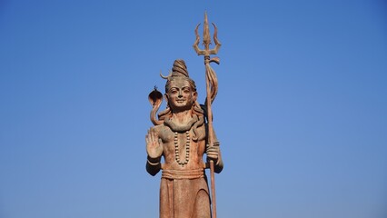 Wall Mural - statue of god shiv holding trishul