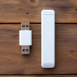 A white flash drive lies on a white wooden table, next to a laptop, top view, super realism created with Generative Ai
