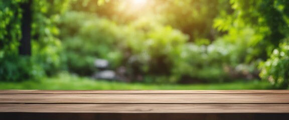 Wall Mural - Wooden table and blurred green nature garden background