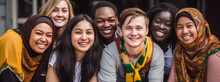 Smiling faces, global embrace a diverse group of young adults