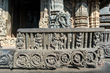 Poster - Beautiful intricate patterns and carvings of figurines on the wall of the ancient Chennakeshava temple in Belur, Karnataka.