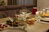 Fototapeta  - Table served for festive dinner in living room