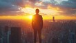 © banthita166 - 'Vision from the Heights: Ambition Over the Urban Sunset' Confident businessman standing at the top of a skyscraper, overlooking the bustling city below as the sun sets.