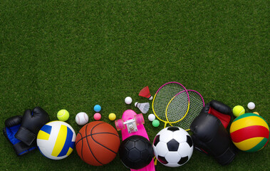 Canvas Print - sport equipment on green grass