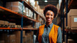 © Marina_Nov - Professional loader is African-American woman in warehouse with boxes of goods on shelves. Smiling uniformed loader demonstrates his willingness and enthusiasm to do his job. Logistics and delivery