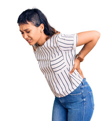 Wall Mural - Young woman wearing casual clothes suffering of backache, touching back with hand, muscular pain