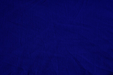 Dark navy deep violet blue texture background for design. Wrinkled crumpled natural cotton fabric cloth. Color. Template. Empty.