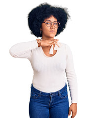 Poster - Young african american girl wearing casual clothes and glasses cutting throat with hand as knife, threaten aggression with furious violence