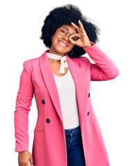 Poster - Young african american girl wearing business clothes and glasses smiling happy doing ok sign with hand on eye looking through fingers