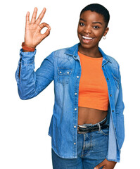 Sticker - Young african american woman wearing casual clothes smiling positive doing ok sign with hand and fingers. successful expression.