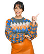 © Krakenimages.com - Young hispanic woman wearing casual clothes smiling happy pointing with hand and finger to the side