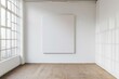 © id512 - empty white room with blank canvas poster mockup on the white wall