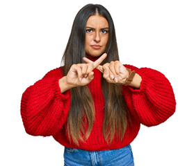 Poster - Beautiful hispanic woman wearing casual clothes rejection expression crossing fingers doing negative sign