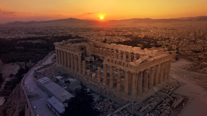 Wall Mural - Aerial drone photo of iconic Acropolis hill and the unique masterpiece of Ancient world the Parthenon at sunset with beautiful golden colours, Athens historic centre, Attica, Greece