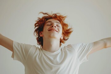 Poster - A woman with red hair wearing a white t-shirt. Perfect for various uses