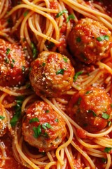 Poster - A delicious plate of spaghetti and meatballs with a savory sauce. Perfect for Italian cuisine or comfort food concepts