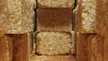 Cane Brown Sugar In Cubes Texture Close-up Macro.Natural Sweet Food Additive.