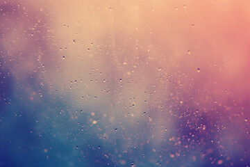 Poster - Raindrops on a window with a blurred pink and blue gradient background, conveying a calm, rainy day atmosphere.