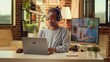 © DC Studio - Freelancer listens to music and solving daily project tasks, lucky to be self employed. African american woman singing songs while she works on responsibilities from the comfort of her warm home.