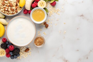 Canvas Print - Morning banana with fresh honey and yogurt on white table near muesli bowl of fruits and berries