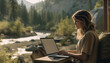 a caucasian female web developer working from a remote location in nature