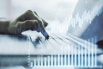 Poster - Multi exposure of abstract financial graph with hand typing on laptop on background, financial and trading concept