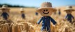 Straw dolls in jeans symbolize farmers and harvest helpers during the grain harvest
