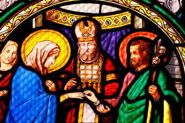 Wall Mural - Saint Leonard church.  Stained glass.  The Marriage of the Virgin Mary and Saint Joseph. Arbois. France.