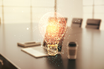 Poster - Creative light bulb hologram on modern laptop background, idea concept. Multiexposure