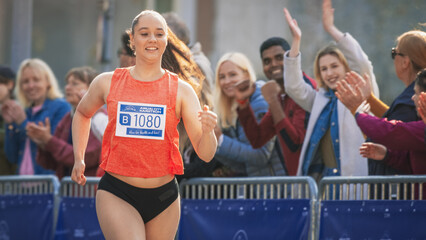  Portrait of a Woman Running and Participating in a Marathon in a Park. Strong Athletic Female Jogger Racing Other Runners with Determination for the First Place in the Finish Line