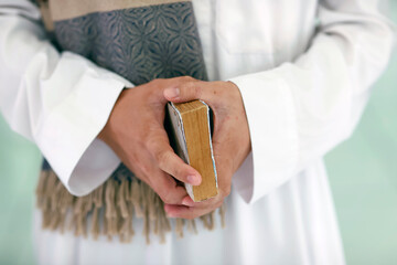 Poster - Jamiul Azhar mosque. Muslim man reading an Arabic Holy Quran (Koran). Vietnam.