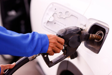 Poster - Gas station. Driver at a filling station buying, petrol, gasoline, fuel.