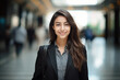 © MASmaker - A happy professional woman, light blurry background