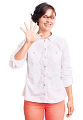 Sticker - Beautiful young woman with short hair wearing elegant white shirt showing and pointing up with fingers number five while smiling confident and happy.