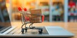 © Thares2020 - Digital commerce delight. Conceptual showcasing online shopping with laptop shopping cart and basket perfect for marketing retail and e commerce business