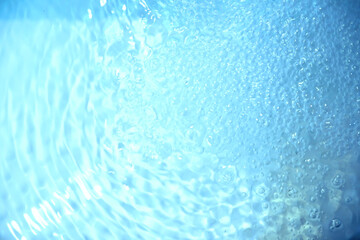 Wall Mural - Blue water texture. Bubbles and bubbling water.