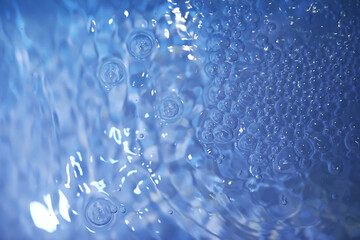 Wall Mural - Blue water texture. Bubbles and bubbling water.